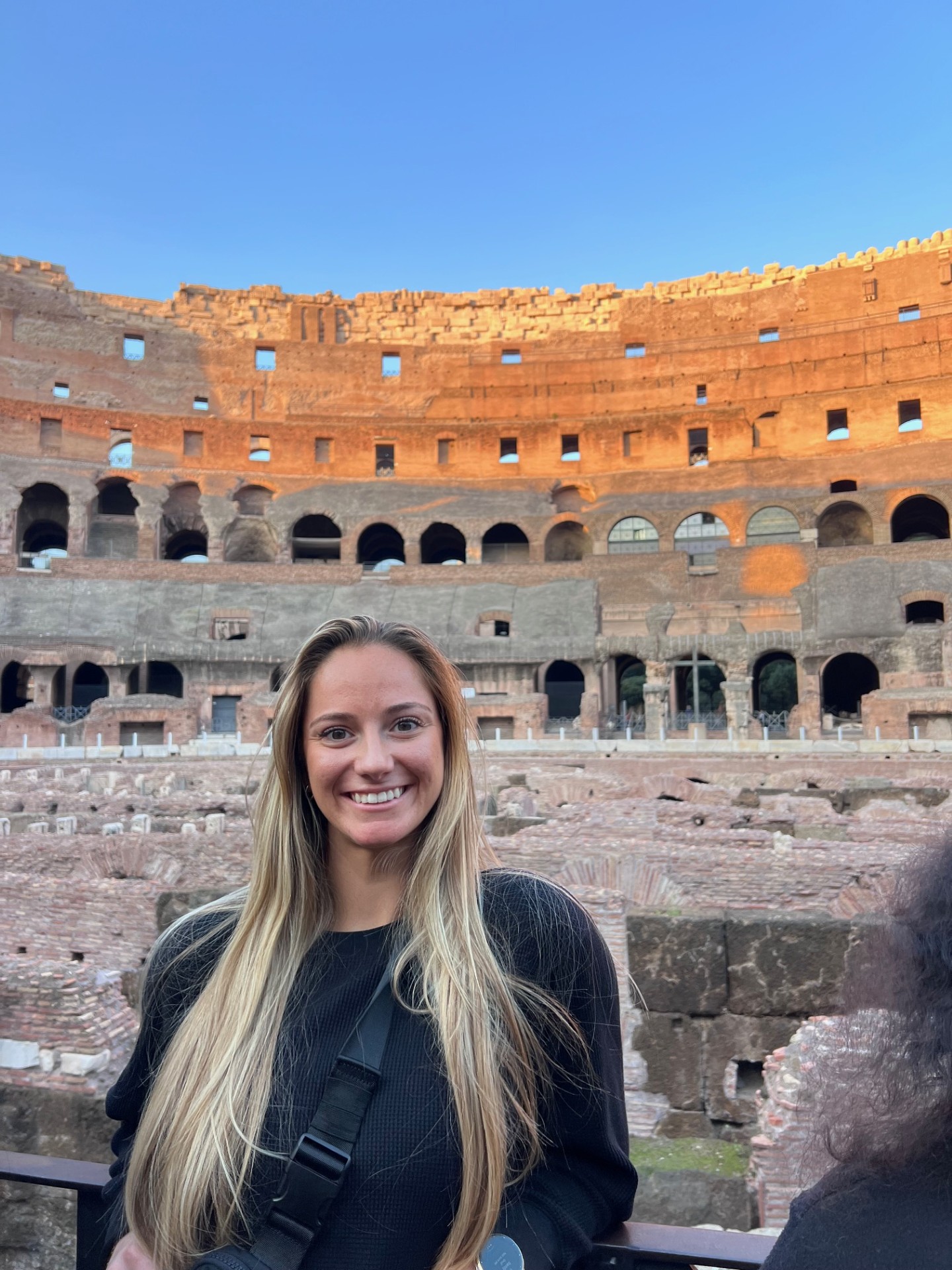 Woman posing at Colosseum