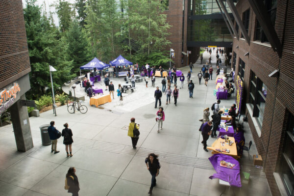 Students walking around the Codex for an event