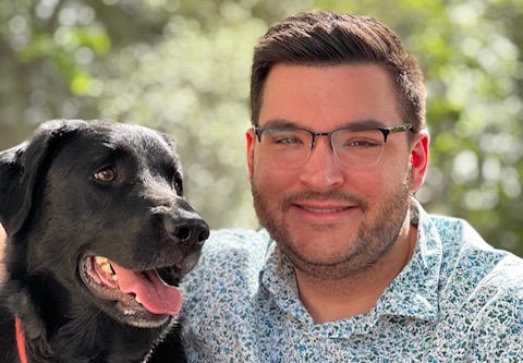 James Booth with his black lab, Sadie