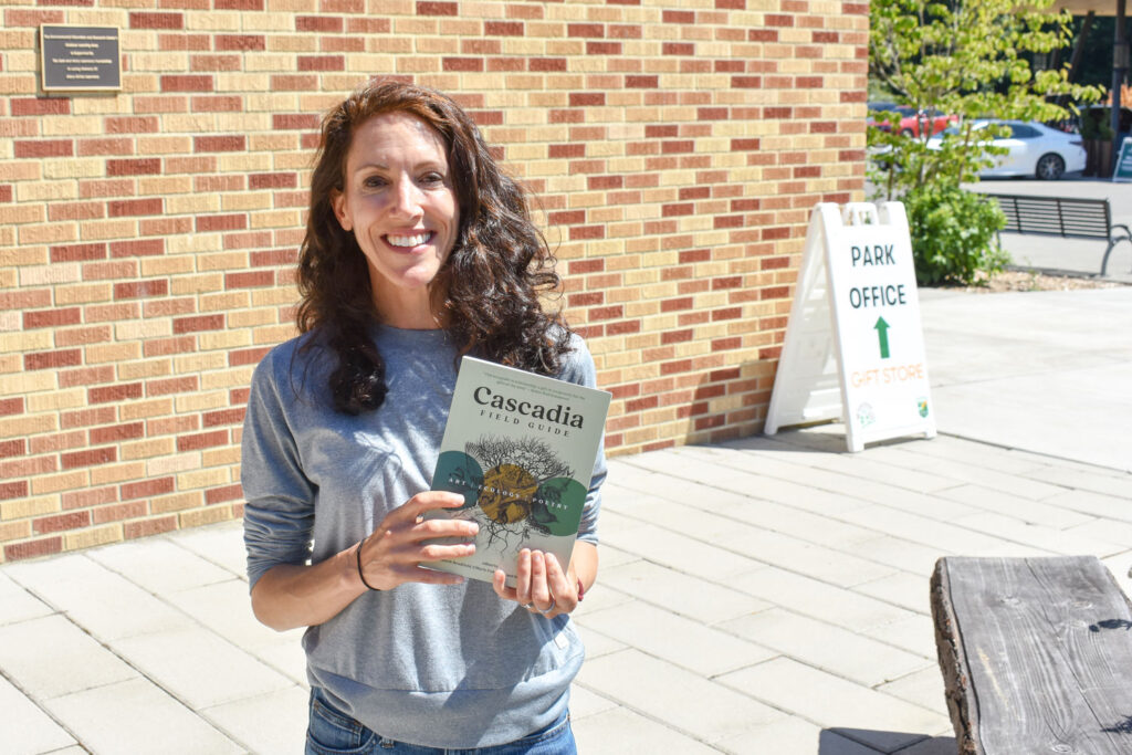 A person holding a book.