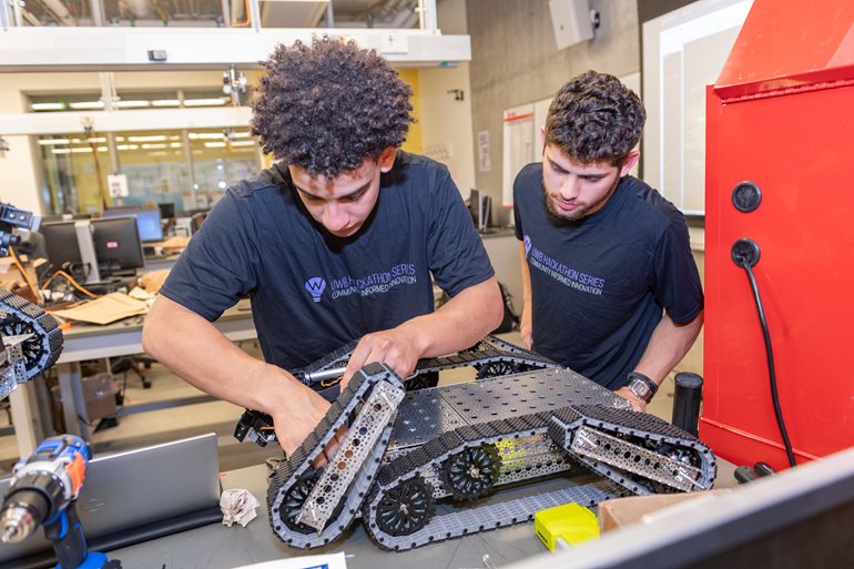 Students work on their rover.