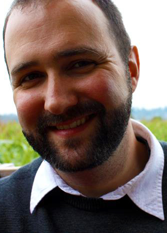 Headshot of Gavin Doyle smiling