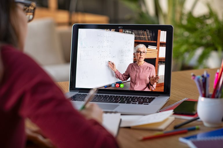 Student looking at remote teacher