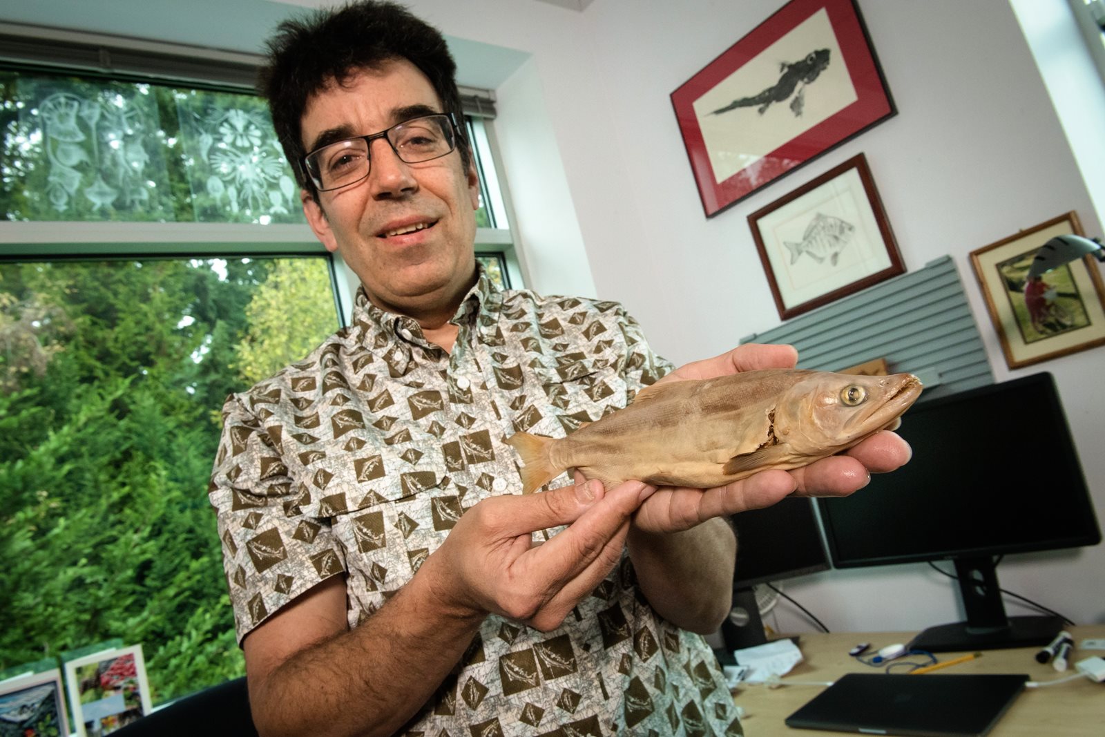 Jeff Jensen with 130-year-old preserved kokanee