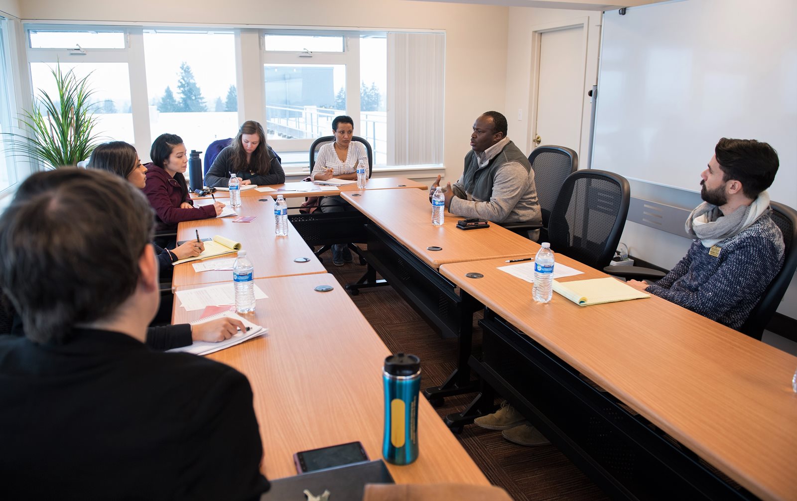 orientation meeting around conference table