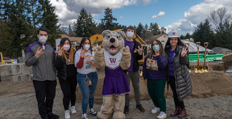 The 2021-22 resident advisers, all students: (l-r) Santi Pedraza, Pearl Ko, Elisa Sagisi, Noah Carper and Amelia Alam, with Resident Director Karan Sandhu. RA Viola Tabares is not pictured.