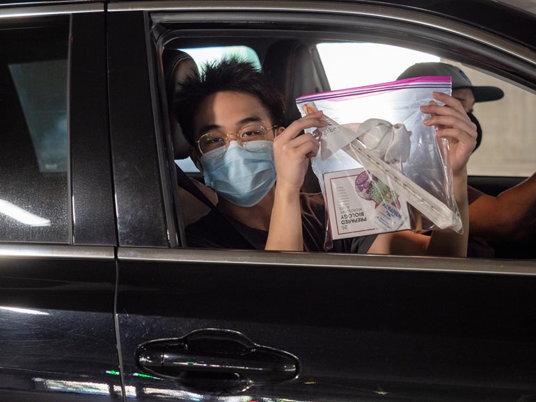 Student picks up heart in drive-thru.